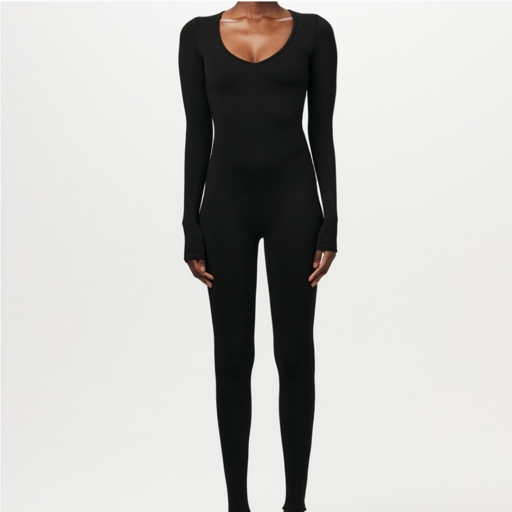 Gently Wore In Excelent Condiotion Naked Wardrobe Black Jumpsuit.